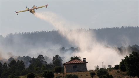 Hundreds evacuated as suspected intentional wildfire hits western Spain